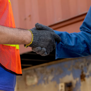 Blue-collar handshake