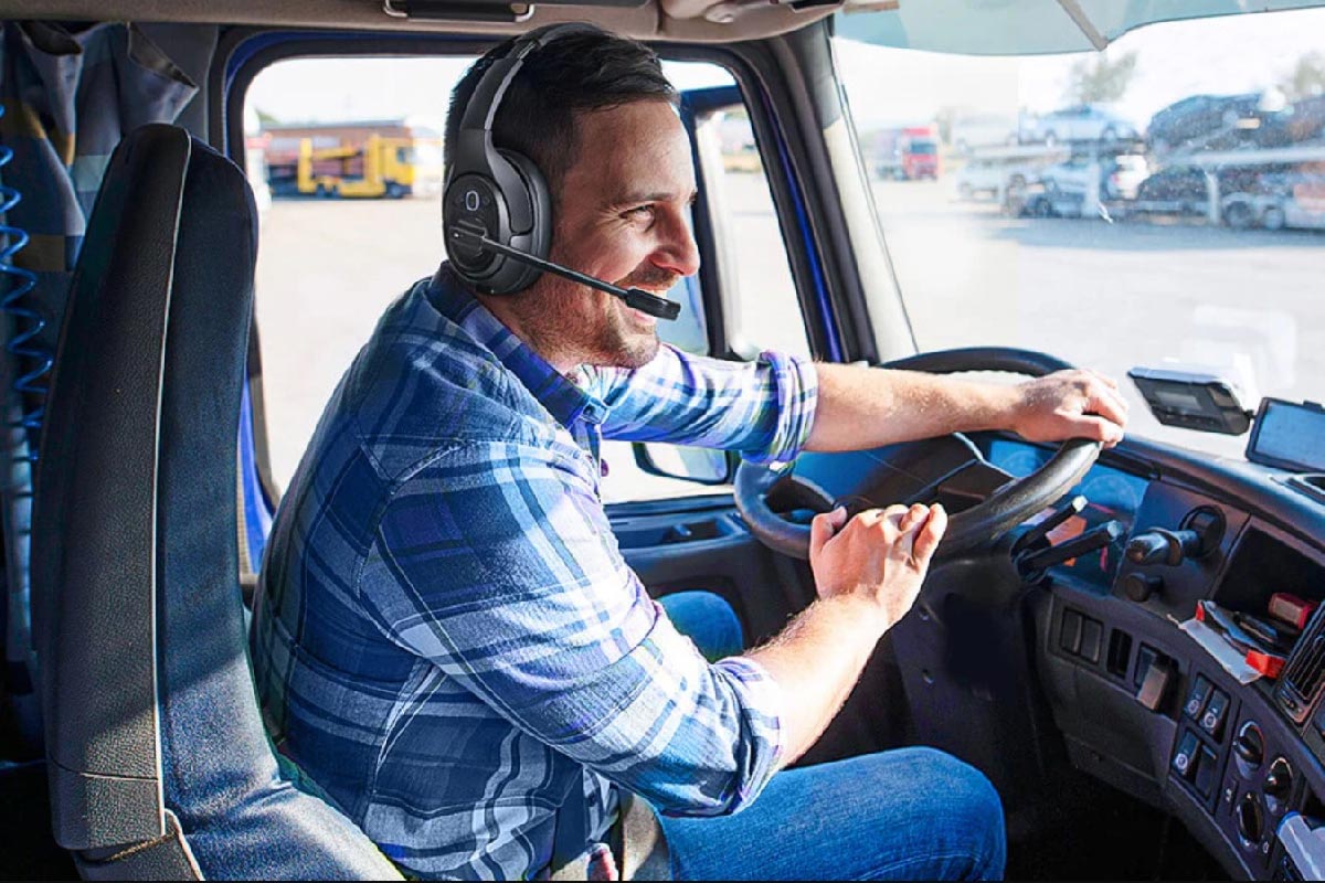 Trucker using a bluetooth headset while driving