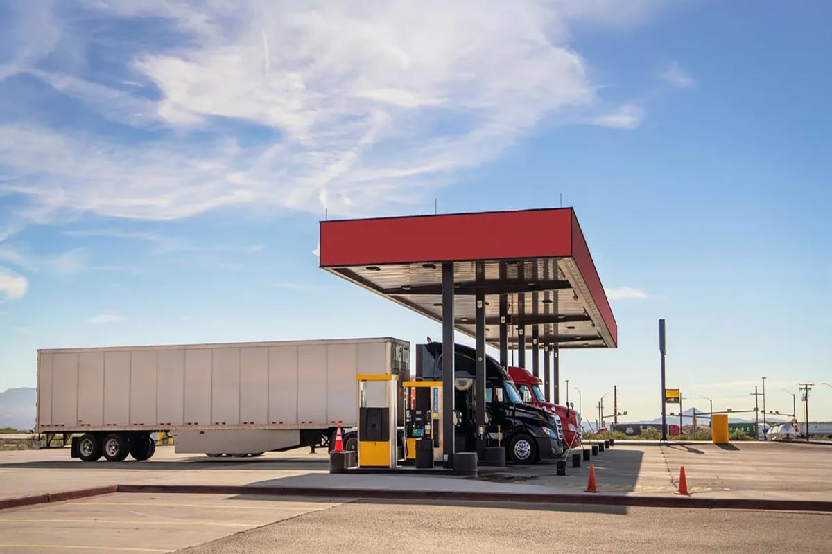 Semi Trucks Fueling with Diesel at a gas station